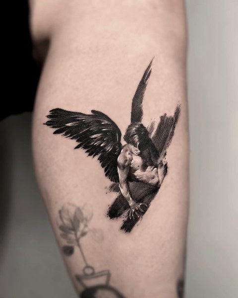 angel tattoo on the calf