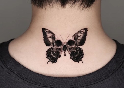 butterfly tattoo on the nape