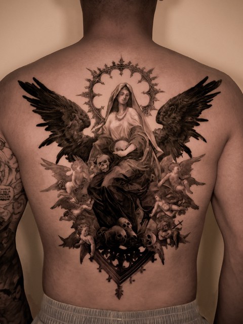 Virgin Mary back piece tattoo
